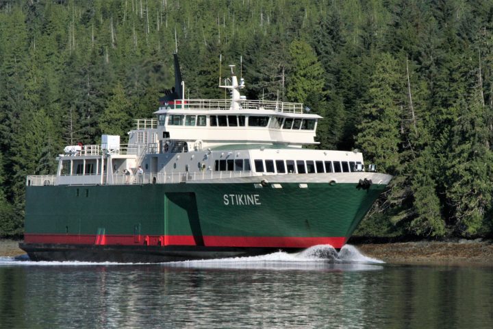 a small boat in a large body of water