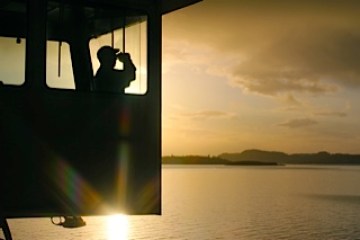 a sunset over a body of water