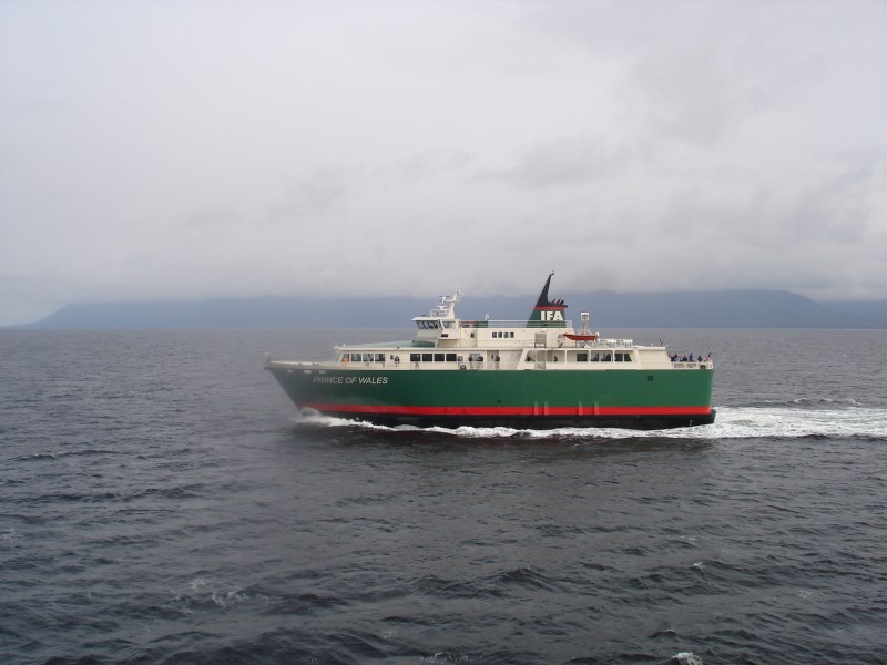 a small boat in a large body of water