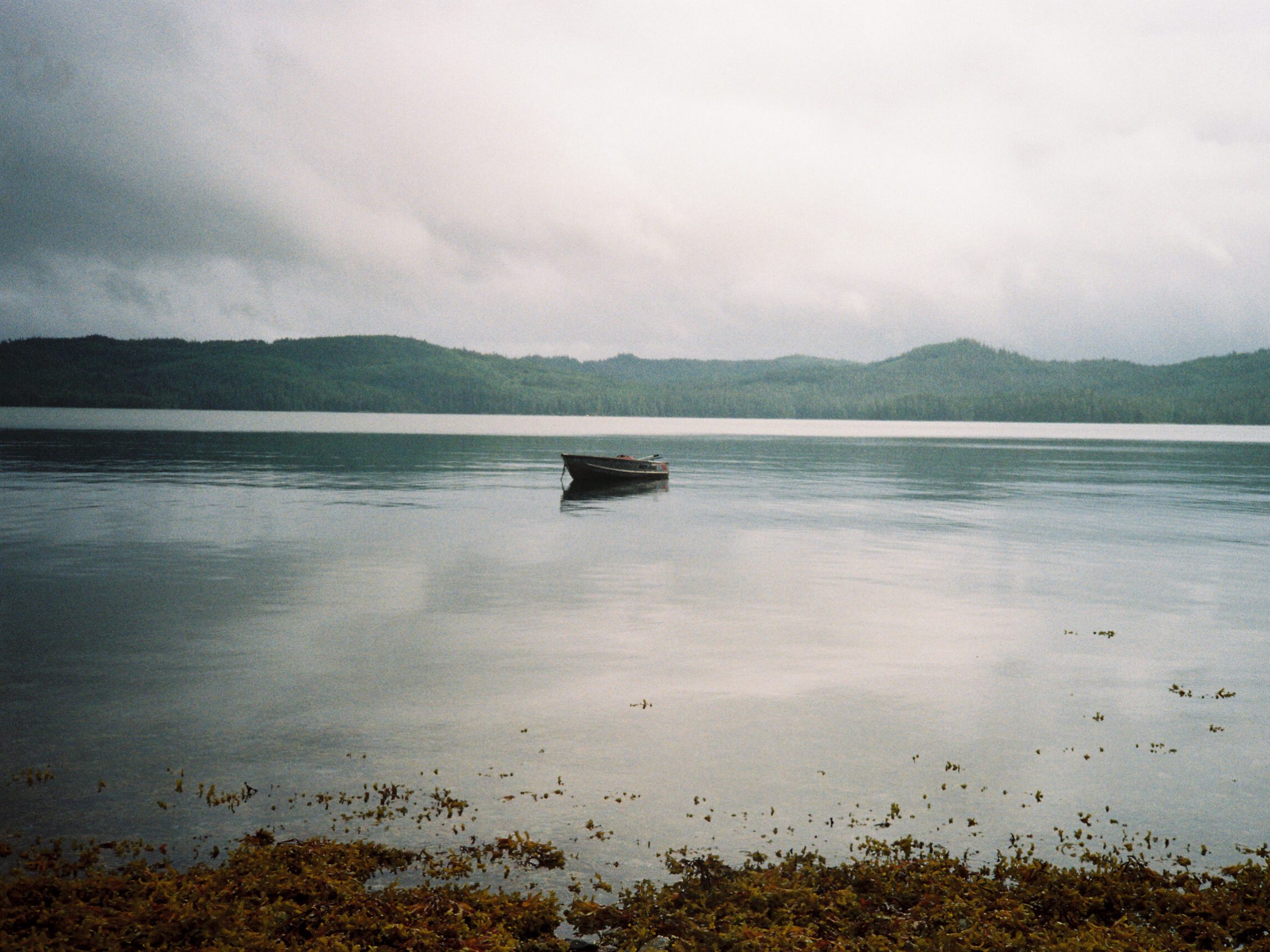 a small boat in a body of water